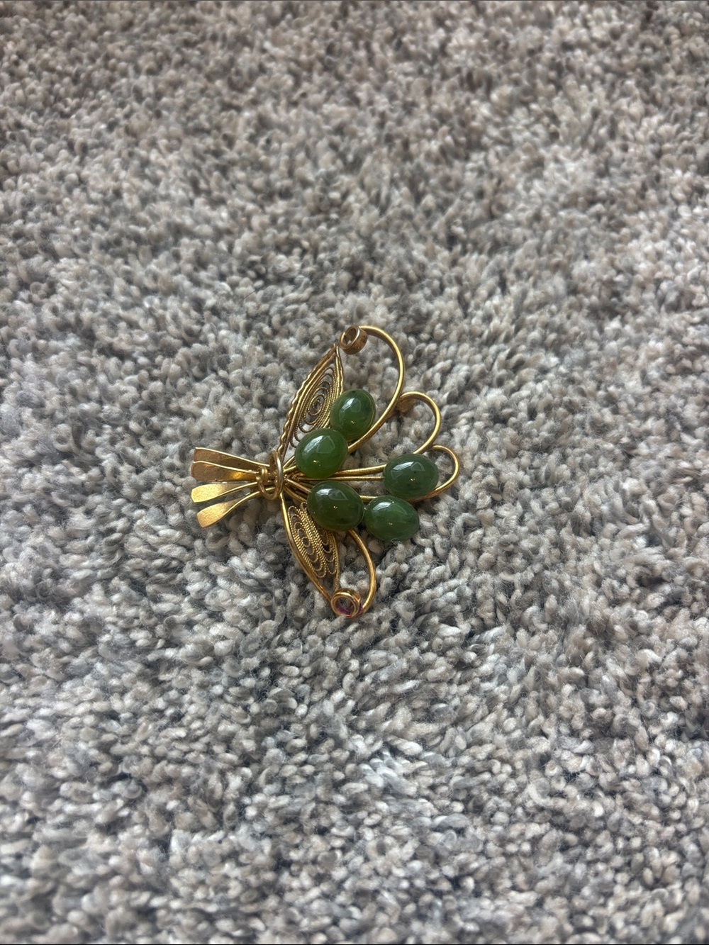 Gold-Tone Floral Brooch with Green Stone Accents